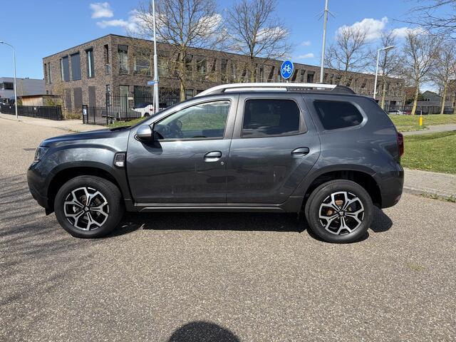 Dacia DUSTER 1.3 TCe Prestige APPLE CARPLAY ANDROID AUTO / AIRCO / PARKEERSENSOREN+CAMERA / NAVIGATIE.