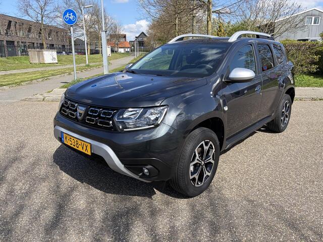 Dacia DUSTER 1.3 TCe Prestige APPLE CARPLAY ANDROID AUTO / AIRCO / PARKEERSENSOREN+CAMERA / NAVIGATIE.