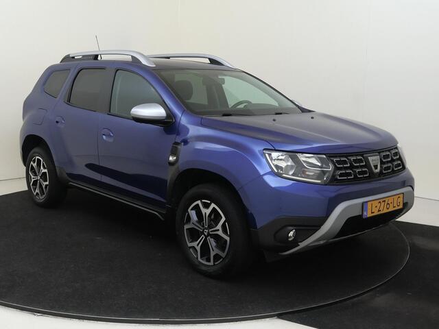 Dacia DUSTER 1.3 TCe Prestige | airco | Apple Carplay/Android Auto | cruise control | dodehoek detectie | lichtmetalen velgen 17" | navigatiesysteem full map | airco automatisch |