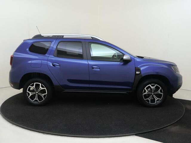 Dacia DUSTER 1.3 TCe Prestige | airco | Apple Carplay/Android Auto | cruise control | dodehoek detectie | lichtmetalen velgen 17" | navigatiesysteem full map | airco automatisch |