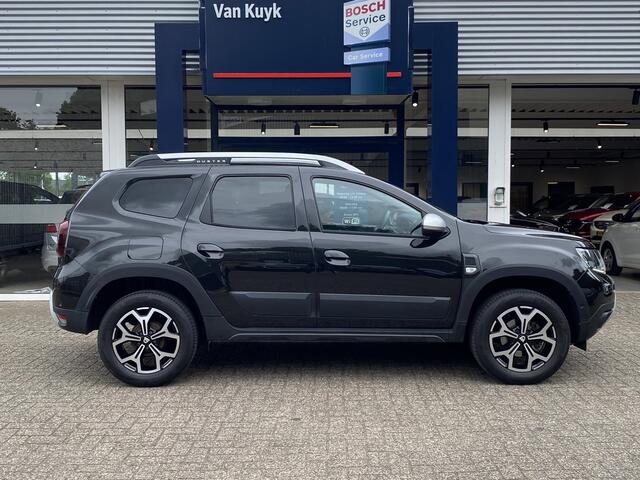 Dacia DUSTER 1.0 TCe Bi-Fuel Prestige / Apple-Carplay&Android-Auto / DAB / Navi / Camera / Airco / Cruise-Control / Getint Glas / ELKTR-Pakket / PDC Achter / LMV 17'' / Winterset LMV 16'' / Dakdragers / ENZ.