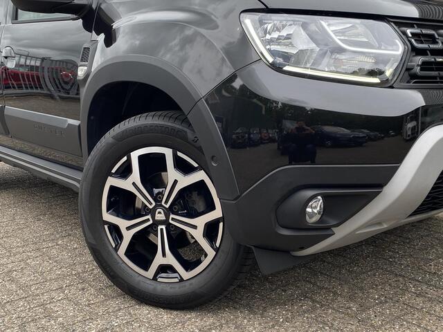 Dacia DUSTER 1.0 TCe Bi-Fuel Prestige / Apple-Carplay&Android-Auto / DAB / Navi / Camera / Airco / Cruise-Control / Getint Glas / ELKTR-Pakket / PDC Achter / LMV 17'' / Winterset LMV 16'' / Dakdragers / ENZ.