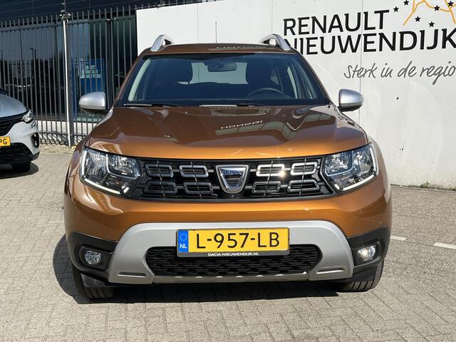 Dacia DUSTER 1.3 TCe Prestige l CAMERA 360 l PARKEERSENSOREN l NAVIGATIE l CLIMATE CONTROL
