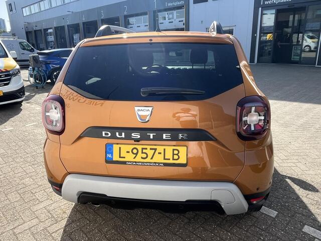 Dacia DUSTER 1.3 TCe Prestige l CAMERA 360 l PARKEERSENSOREN l NAVIGATIE l CLIMATE CONTROL