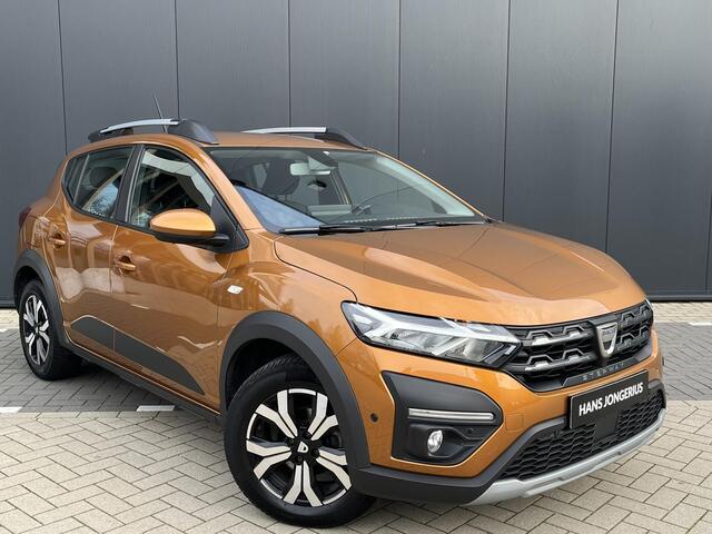 Dacia SANDERO Stepway TCe 100 Bi-Fuel Comfort | NAVI | CLIAMTE EN CRUISE CONTROL | 1E EIGENAAR | DEALER ONDERHOUDEN | APPL ECARPLAY EN ANDROID AUTO | DODEHOEK DETECTIE | SENSOREN V+A | CAMERA | ALL SEASONBANDEN |