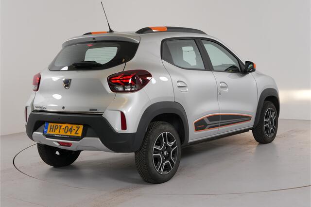 Dacia Spring 27 kWh Orange pack | Camera | Navi | Cruise | Airco | PDC | Bluetooth |