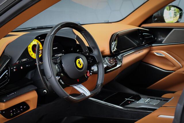 Ferrari Purosangue 6.5 V12 | NEW | 135K OPTIONS | CARBON WHEELHOUSE, R+F DIFFUSERS, UNDERDOOR, MIRRORS, DOORPANELS, KICKPLATE, CENTRE CONSOLE, FRONT SPOILER, STEERING WHEEL HEATED INCL LEDS | PANORAMIC ROOF | FRONT LIFT | BLACK TAILPIPES | VENTI MASSAGE REAR SEATS | FULL LE