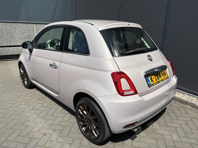 Fiat 500 1.2 Star Powder Pink Glazen panoramadak - Climate control - Parkeersensor achter - Cruise control - Mistlampen - Licht metalen velgen 16 inch - Bluetooth - Radio - Stuur multifunctioneel - Elektrische ramen - Lederen bekleding - Extra getint glas achter
