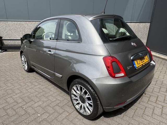 Fiat 500C 0.9 TwinAir Turbo Lounge Automaat Glazen panoramadak - Airco - Navigatie - Parkeersensor achter - Licht metalen velgen 15 inch - Cruise control - Mistlampen - Elektrische ramen - Stuur multifunctioneel - Bluetooth - Centrale vergrendeling met afstandsbedi