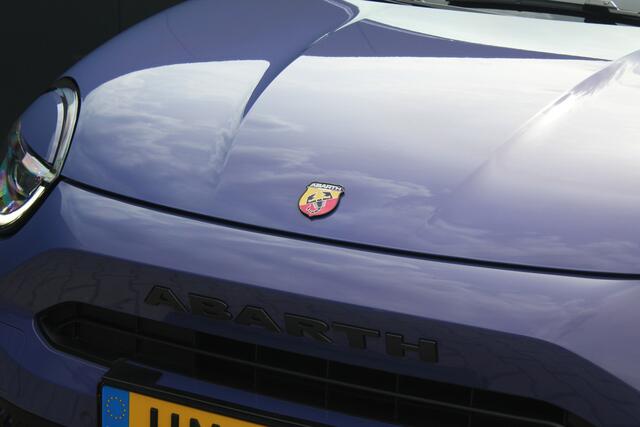 Fiat Abarth 600e Scorpionissima 54 kWh 282PK | Fabrieksgarantie | Kuipstoelen | 20" LMV | LED | Camera | Adaptive cruise | Half leder/alcantara | Voorruit verwarming | Keyless entry en go | Dodehoek detectie | Navigatie |