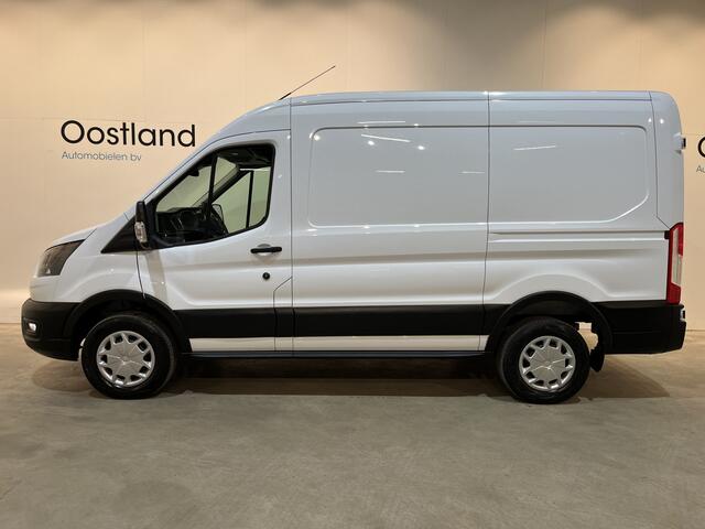 Ford E-Transit 350 L2H2 Trend 89 kWh / 100% Elektrisch !! / Airco / Cruise Control / CarPlay / Camera / Navigatie / 3-Zits / 11.000 KM !!