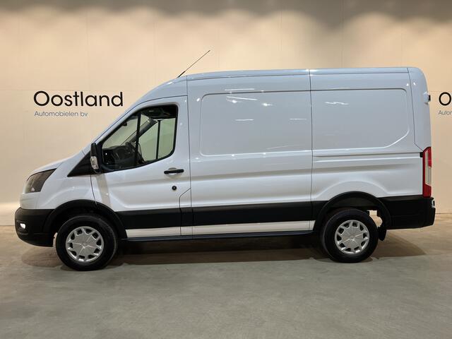 Ford E-Transit 350 L2H2 Trend 68 kWh / 100% Elektrisch !! / Airco / Cruise Control / CarPlay / Camera / Navigatie / 3-Zits / 5.300 KM !!