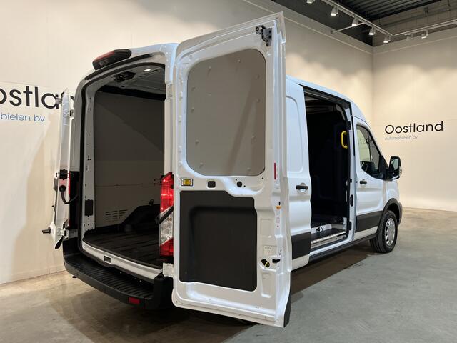 Ford E-Transit 390 (3500 kg) L2H2 Trend 68 kWh / 100% Elektrisch !! / Airco / Cruise Control / CarPlay / Camera / Navigatie / 3-Zits / 13.850 KM !!