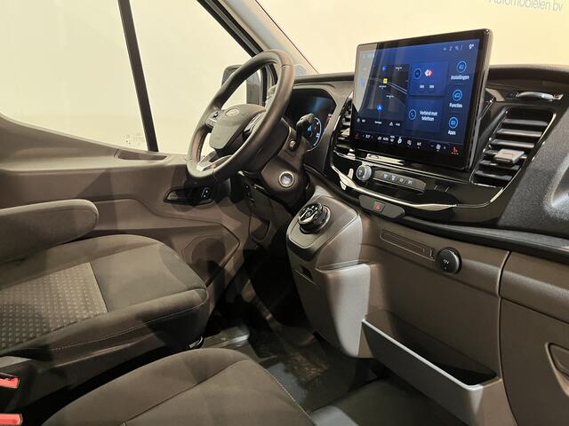 Ford E-Transit 390 (3500 kg) L2H2 Trend 68 kWh / 100% Elektrisch !! / Airco / Cruise Control / CarPlay / Camera / Navigatie / 3-Zits / 1.300 KM !!