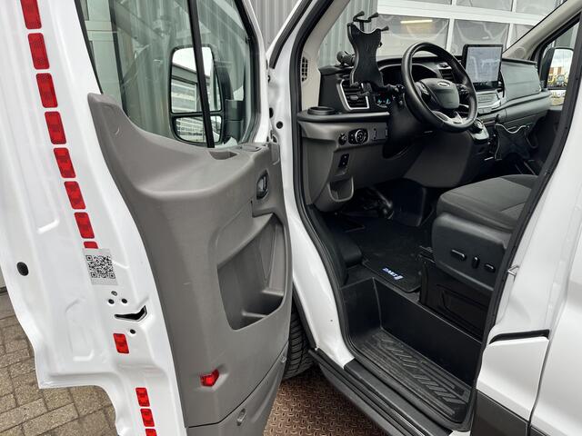 Ford E-Transit 350 L3H2 Trend 68 kWh Kastinrichting Werkplaatsinrichting Airco Cruise controle 360° Camera Navigatiesysteem Telefoonverbinding Parkeersensoren voor en achter 2-Persoons Oplaadkabels Stoelverwarming Bottinrichting