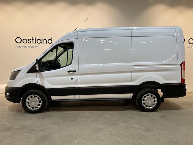 Ford E-Transit 390 (3500 kg) L2H2 Trend 68 kWh / 100% Elektrisch !! / Airco / Cruise Control / CarPlay / Camera / Navigatie / 3-Zits / 12.700 KM !!