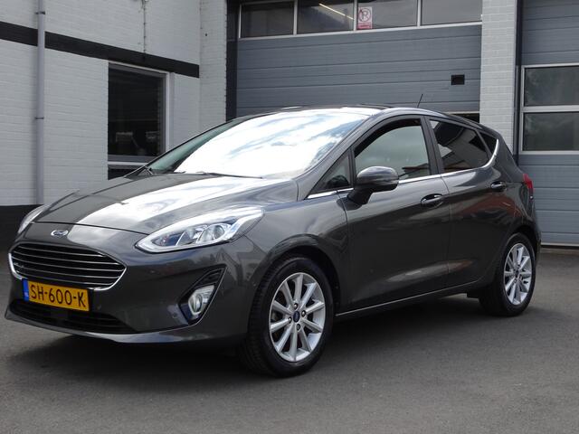 Ford FIESTA 1.0 EcoBoost Titanium Automatische airco, stuurverwarming, stoelverwarming, navigatie, parkeersensoren voor en achter, licht metalen velgen,enz,enz.