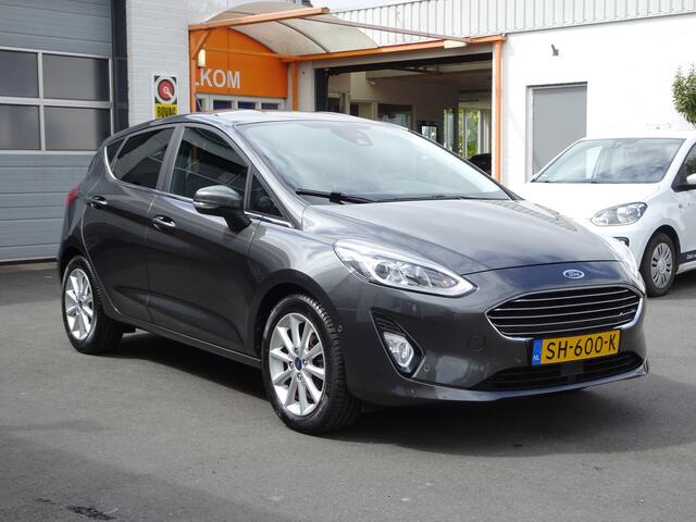 Ford FIESTA 1.0 EcoBoost Titanium Automatische airco, stuurverwarming, stoelverwarming, navigatie, parkeersensoren voor en achter, licht metalen velgen,enz,enz.