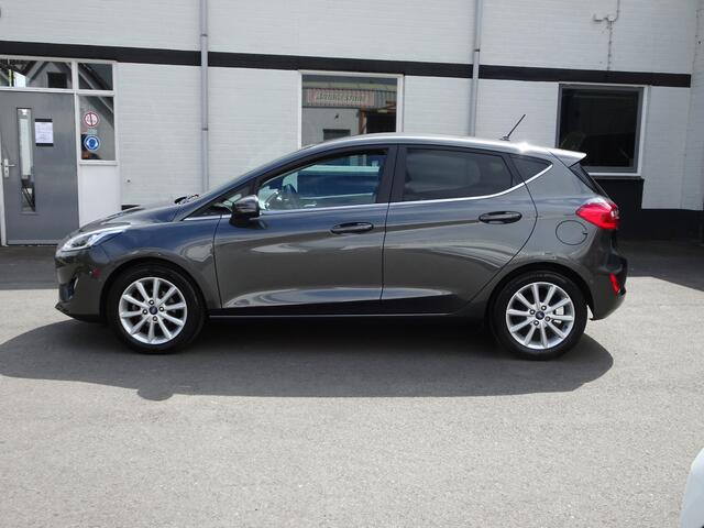 Ford FIESTA 1.0 EcoBoost Titanium Automatische airco, stuurverwarming, stoelverwarming, navigatie, parkeersensoren voor en achter, licht metalen velgen,enz,enz.
