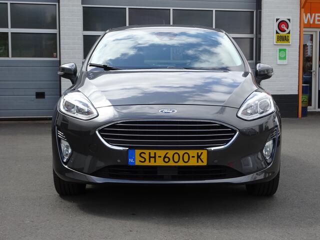 Ford FIESTA 1.0 EcoBoost Titanium Automatische airco, stuurverwarming, stoelverwarming, navigatie, parkeersensoren voor en achter, licht metalen velgen,enz,enz.