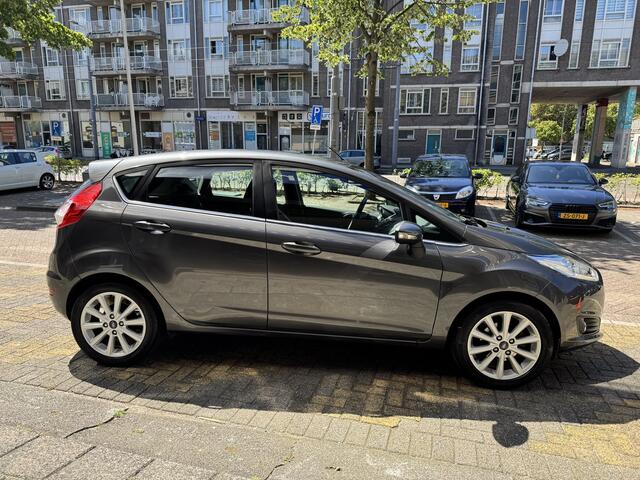 Ford FIESTA 1.0 EcoBoost Titanium 88022KM! NAP | 1e eigenaar | Navigatie | Climate Control | Cruise Control | Parkeersensoren | Lichtmalen velgen | Dealeronderhouden |