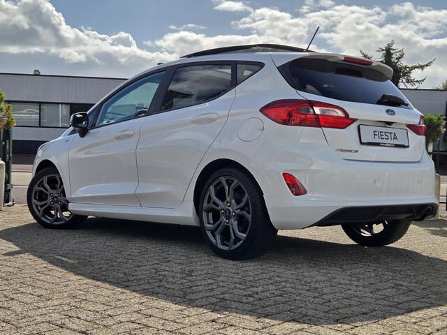 Ford FIESTA 1.0 ST-Line PANORAMADAK|NAVIGATIE|CAMERA|CRUISE CONTROL|STOEL&STUUR VERWARMING|ECC/AIRCO|PDC ACHTER|17 INCH|DEALERE ONDERHOUDEN Maandag tot Vrijdag geopend van 09.00 tot 20.00 uur en Zaterdag van 09.00 tot 18.00 uur