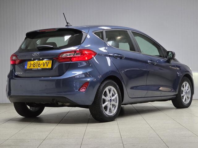 Ford FIESTA 1.0 EcoBoost Titanium/ 15'' LMV/ DAB+/ Lane-Assist./ 15'' LMV/ Clima/ Cruise/ Elek. pakket/ Isofix/ Bluetooth/ Armsteun/ Multi. LEDER. Stuur/ Mistl./ PDC/ LED Dagrijverl.