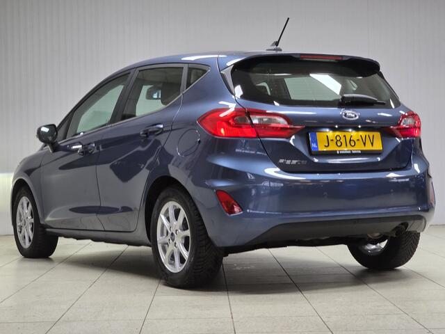 Ford FIESTA 1.0 EcoBoost Titanium/ 15'' LMV/ DAB+/ Lane-Assist./ 15'' LMV/ Clima/ Cruise/ Elek. pakket/ Isofix/ Bluetooth/ Armsteun/ Multi. LEDER. Stuur/ Mistl./ PDC/ LED Dagrijverl.