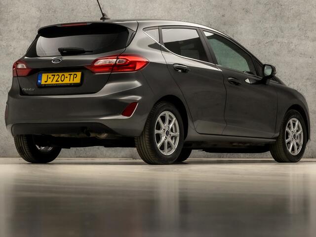 Ford FIESTA 1.0 EcoBoost Titanium (APPLE CARPLAY, GROOT NAVI, CLIMATE, GETINT GLAS, PARKEERSENSOREN, SPORTSTOELEN, CRUISE, LM VELGEN, NIEUWSTAAT)