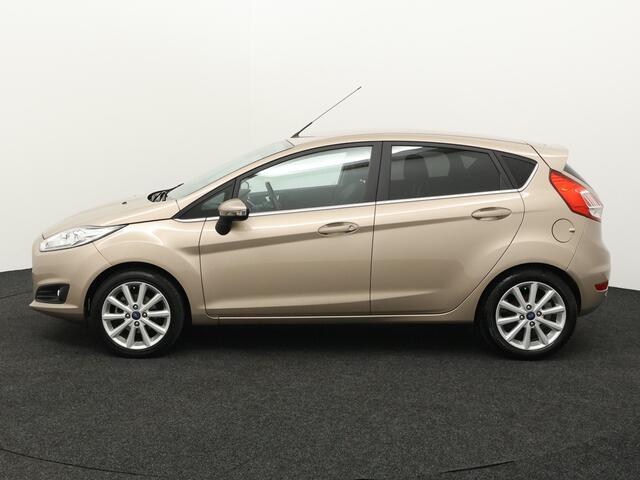 Ford FIESTA 1.0 EcoBoost Titanium Trekhaak, Bluetooth, Cruise control, Parkeersensor achter, Regensensor, Verwarmd voorruit, Lichtmetalen velgen 16, Ontdek deze sportieve en betrouwbare Ford Fiesta 1.0 EcoBoost Titanium uit 2017 met handgeschakelde transmissie. Dankz