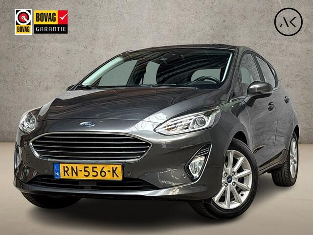Ford FIESTA 1.0 EcoBoost Titanium (APPLE CARPLAY, GROOT NAVI, STUUR/STOELVERWARMING, BANG&OLUFSEN, CAMERA, SPORTSTOELEN, ADAPTIVE CRUISE, LM VELGEN, NIEUWSTAAT)
