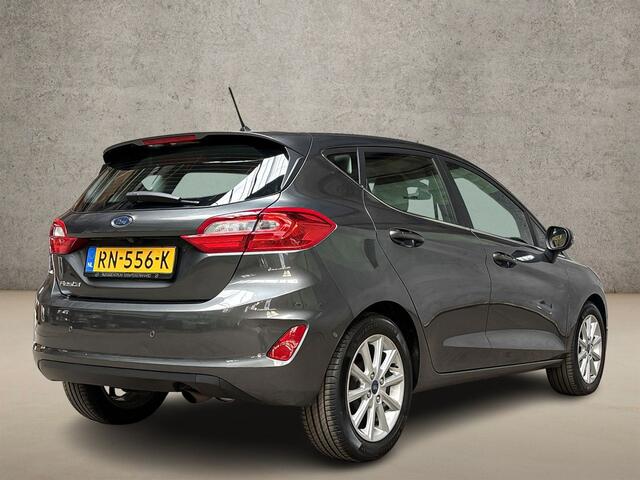Ford FIESTA 1.0 EcoBoost Titanium (APPLE CARPLAY, GROOT NAVI, STUUR/STOELVERWARMING, BANG&OLUFSEN, CAMERA, SPORTSTOELEN, ADAPTIVE CRUISE, LM VELGEN, NIEUWSTAAT)
