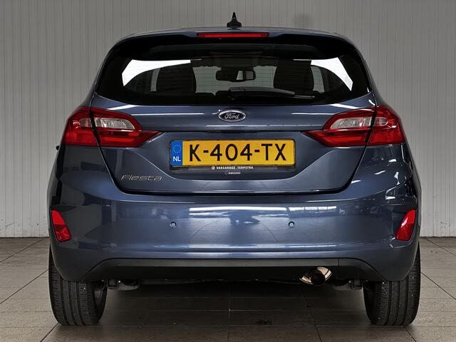 Ford FIESTA 1.0 EcoBoost Titanium/ 15'' LMV/ LED Koplampen/ DAB+/ Lane-Assist./ Clima/ Cruise/ Elek. pakket/ Isofix/ Bluetooth/ Multi. LEDER. Stuur/ Mistl./ PDC/ Chroom/ LED Dagrijverl.