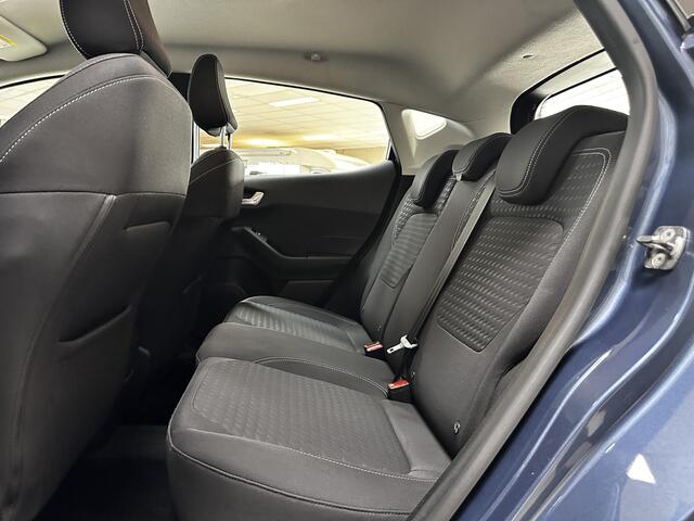 Ford FIESTA 1.0 EcoBoost Titanium/ 15'' LMV/ LED Koplampen/ DAB+/ Lane-Assist./ Clima/ Cruise/ Elek. pakket/ Isofix/ Bluetooth/ Multi. LEDER. Stuur/ Mistl./ PDC/ Chroom/ LED Dagrijverl.