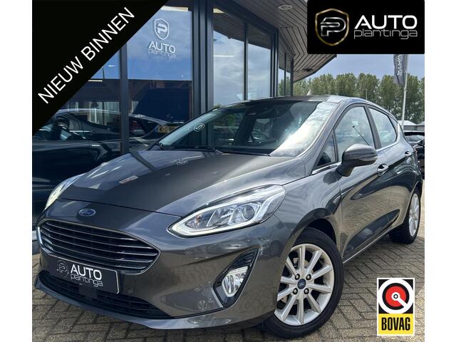 Ford FIESTA 1.0 EcoBoost Titanium 101PK | 1e Eigenaar! | Dealeronderhouden | NL AUTO | AUTOMAAT | Trekhaak | Achteruitrijcamera | B&O Audio | Navigatie | Climate Control | Adaptive Cruise Control | Voorruitverwarming | Parkeersensoren Voor en Achter |