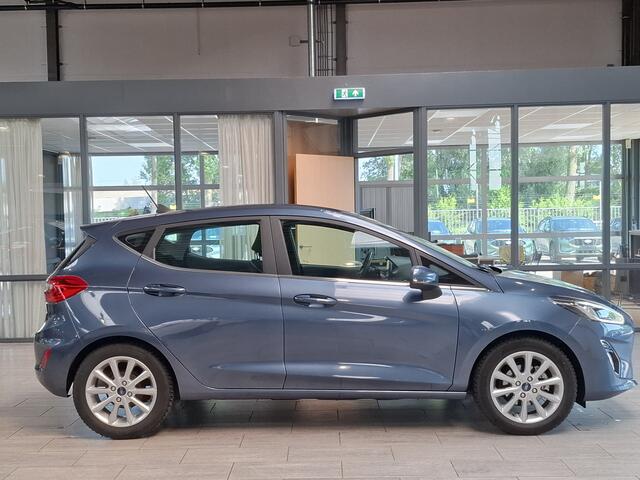 Ford FIESTA EcoBoost 100pk Titanium | Adapt. Cruise | B&O | Trekhaak | Parkeerhulp | Camera | B&O | Apple/Android Carplay |