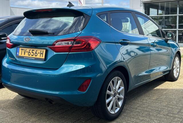Ford FIESTA 1.0 EcoBoost Titanium 101PK | LUXE | Achteruitrijcamera | B&O Audio | Climate Control | Navigatie | Adaptive Cruise Control | Voorruitverwarming | Parkeersensoren Voor en Achter | Lichtmetalen Velgen | 2 Sleutels | DAB+ | NAP |