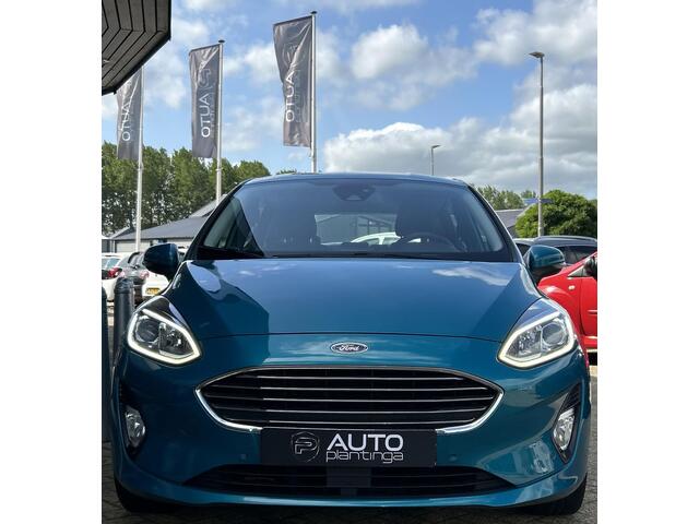 Ford FIESTA 1.0 EcoBoost Titanium 101PK | LUXE | Achteruitrijcamera | B&O Audio | Climate Control | Navigatie | Adaptive Cruise Control | Voorruitverwarming | Parkeersensoren Voor en Achter | Lichtmetalen Velgen | 2 Sleutels | DAB+ | NAP |