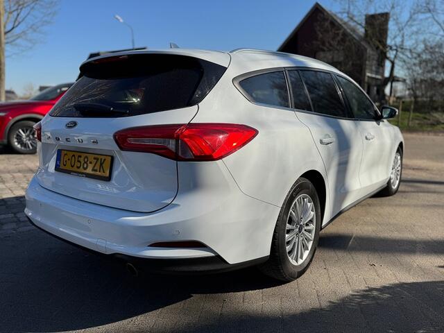 Ford FOCUS Wagon 1.5 120pk autom Tit Bns ecc,navi,lmv,cruise,pdc,chroom,dglas