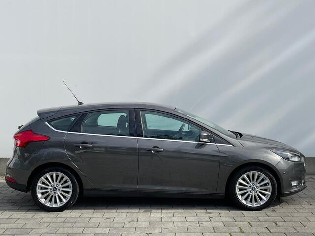 Ford FOCUS Titanium HB | Verwarmde voorruit | Cruise | Parkeersens. | Trekhaak | Navi