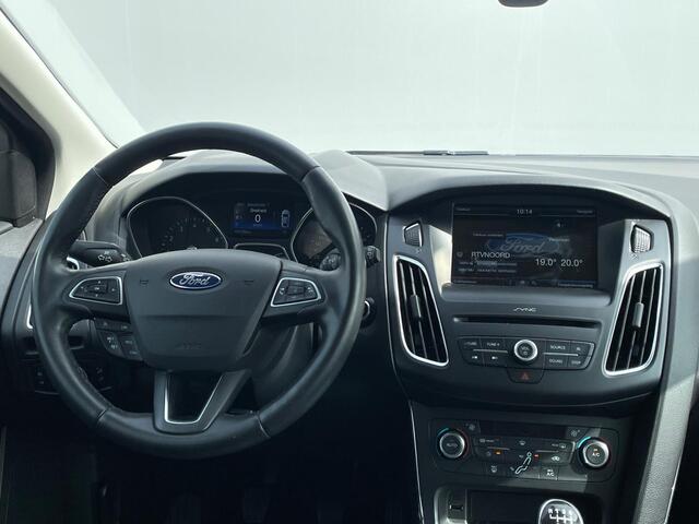 Ford FOCUS Titanium HB | Verwarmde voorruit | Cruise | Parkeersens. | Trekhaak | Navi