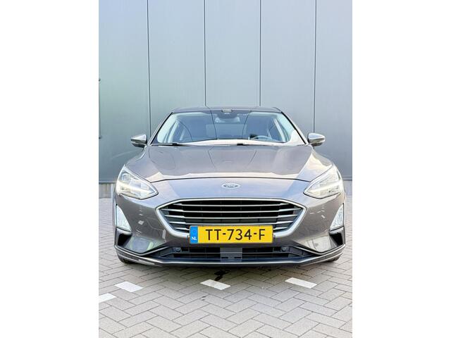 Ford FOCUS 1.0 EcoBoost Titanium Business 125 PK | Navigatie | Bang & Olufsen | Apple CarPlay | Android auto | Parkeersensoren | Camera | Climate control | Draadloze telefoonlader | Lichtmetalen velgen | Adaptieve cruise control |