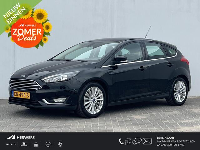 Ford FOCUS 1.0 Titanium / Navigatie full map / Cruise- en Climate Control / Parkeersensoren voor en achter / Keyless Start / Verwarmde Voorruit / Bluetooth / Radio / All Season Banden