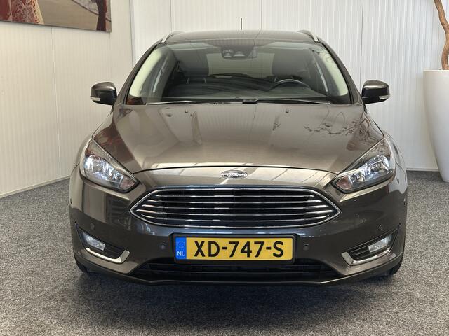 Ford FOCUS Wagon 1.0 Titanium NAVIGATIE CRUISE CONTROL STOEL EN STUURVERWARMING APPLE CARPLAY/ANDROID RIJSTROOKSENSOREN DODEHOEKSENSOREN KEYLESS GO TREKHAAK ACHTERUITRIJCAMERA ZEER MOOI !! 3010