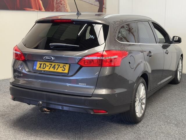 Ford FOCUS Wagon 1.0 Titanium NAVIGATIE CRUISE CONTROL STOEL EN STUURVERWARMING APPLE CARPLAY/ANDROID RIJSTROOKSENSOREN DODEHOEKSENSOREN KEYLESS GO TREKHAAK ACHTERUITRIJCAMERA ZEER MOOI !! 3010