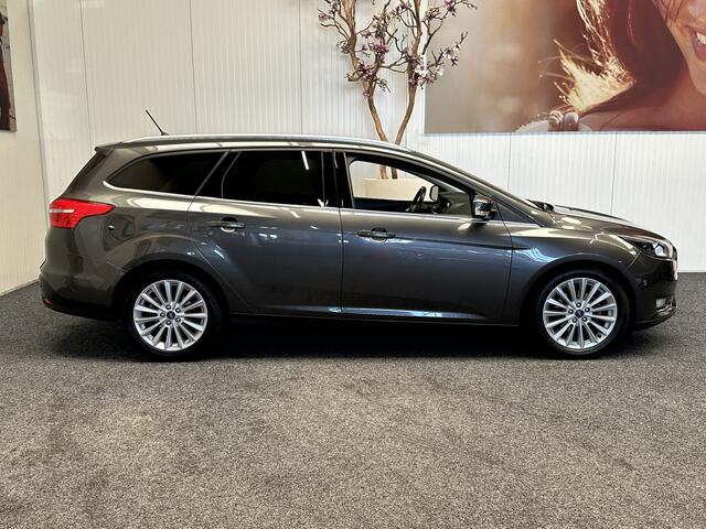 Ford FOCUS Wagon 1.0 Titanium NAVIGATIE CRUISE CONTROL STOEL EN STUURVERWARMING APPLE CARPLAY/ANDROID RIJSTROOKSENSOREN DODEHOEKSENSOREN KEYLESS GO TREKHAAK ACHTERUITRIJCAMERA ZEER MOOI !! 3010
