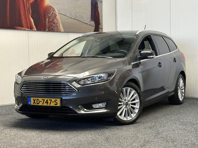 Ford FOCUS Wagon 1.0 Titanium NAVIGATIE CRUISE CONTROL STOEL EN STUURVERWARMING APPLE CARPLAY/ANDROID RIJSTROOKSENSOREN DODEHOEKSENSOREN KEYLESS GO TREKHAAK ACHTERUITRIJCAMERA ZEER MOOI !! 3010