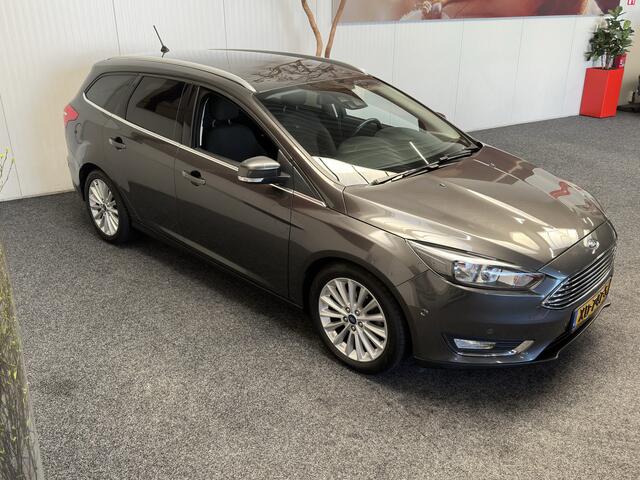 Ford FOCUS Wagon 1.0 Titanium NAVIGATIE CRUISE CONTROL STOEL EN STUURVERWARMING APPLE CARPLAY/ANDROID RIJSTROOKSENSOREN DODEHOEKSENSOREN KEYLESS GO TREKHAAK ACHTERUITRIJCAMERA ZEER MOOI !! 3010