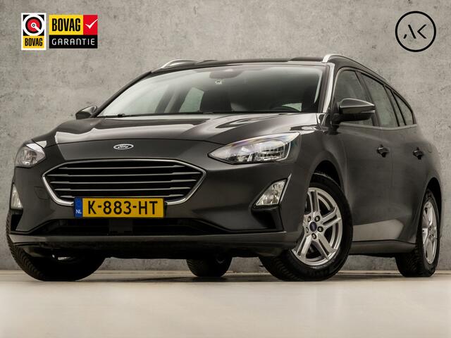 Ford FOCUS Wagon 1.0 EcoBoost Sport (APPLE CARPLAY, CAMERA, TREKHAAK, MODE KNOP, SPORTSTOELEN, LM VELGEN, PARKEERSENSOREN, CRUISE, NIEUWSTAAT)