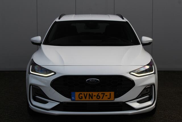 Ford FOCUS Wagon 1.0-125pk EcoBoost Mild-Hybrid ST-Line. In nieuwstaat ! Slechts 3.850km ! Autm. airco dual, camera, pdc v+a, adaptieve cruise cntrl, side- en lane assist, LED verlichting, stoel-, stuur- en voorraamverw., LM wielen, navigatie, telefoonvoorb. etc.